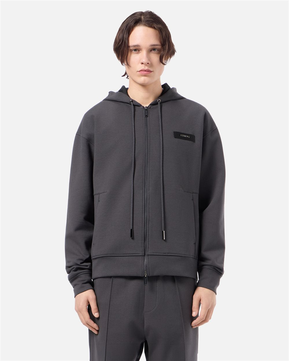Felpa hoodie zippata in neoprene tecnico con zip grigio e verde scuro