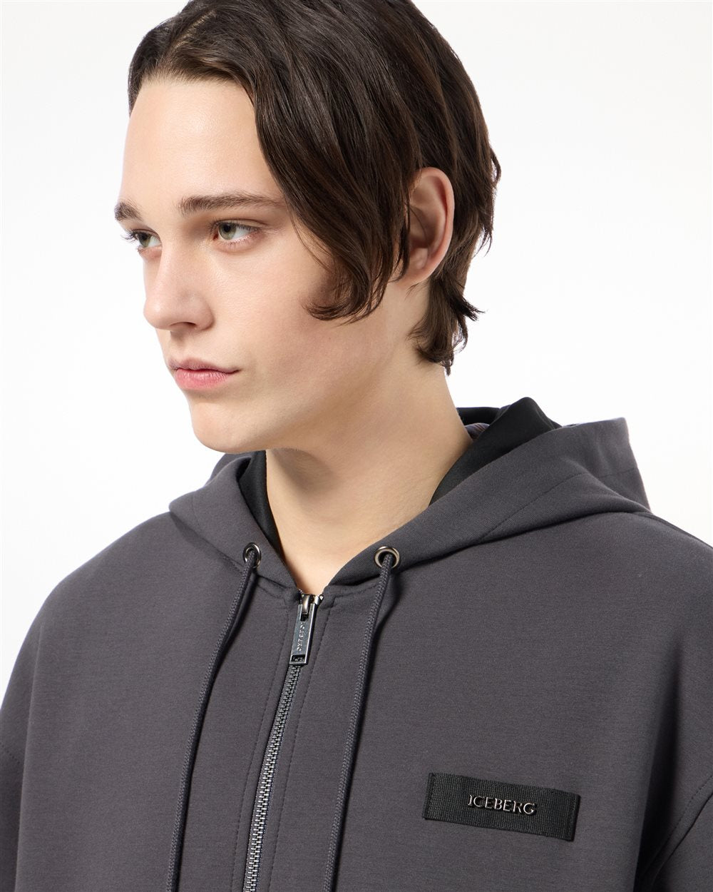 Felpa hoodie zippata in neoprene tecnico con zip grigio e verde scuro
